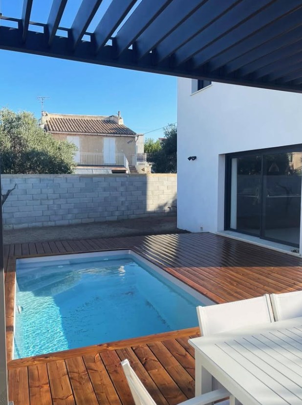 Réalisation JS Wood avec terrasse et piscine